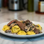 steak and mushroom tortellini alfredo featured